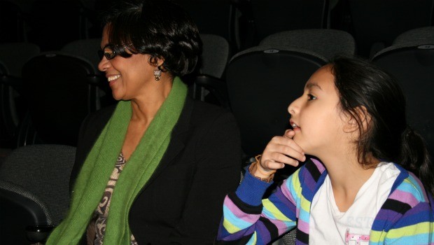 The young playwright and her dramaturge watch the rehearsal of a play about fish.